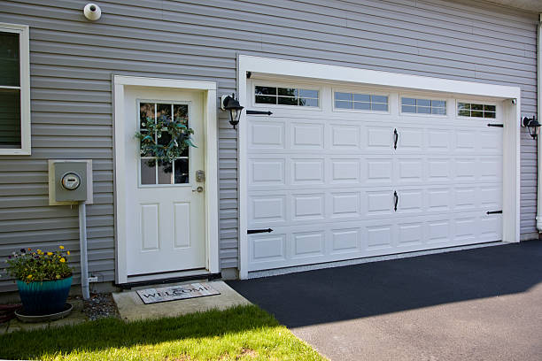 24/7 Emergency Garage Door Panel Replacement experts in Roland, OK